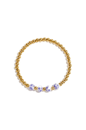 Massives Perlenarmband mit Perlen in blauem Blumenmuster