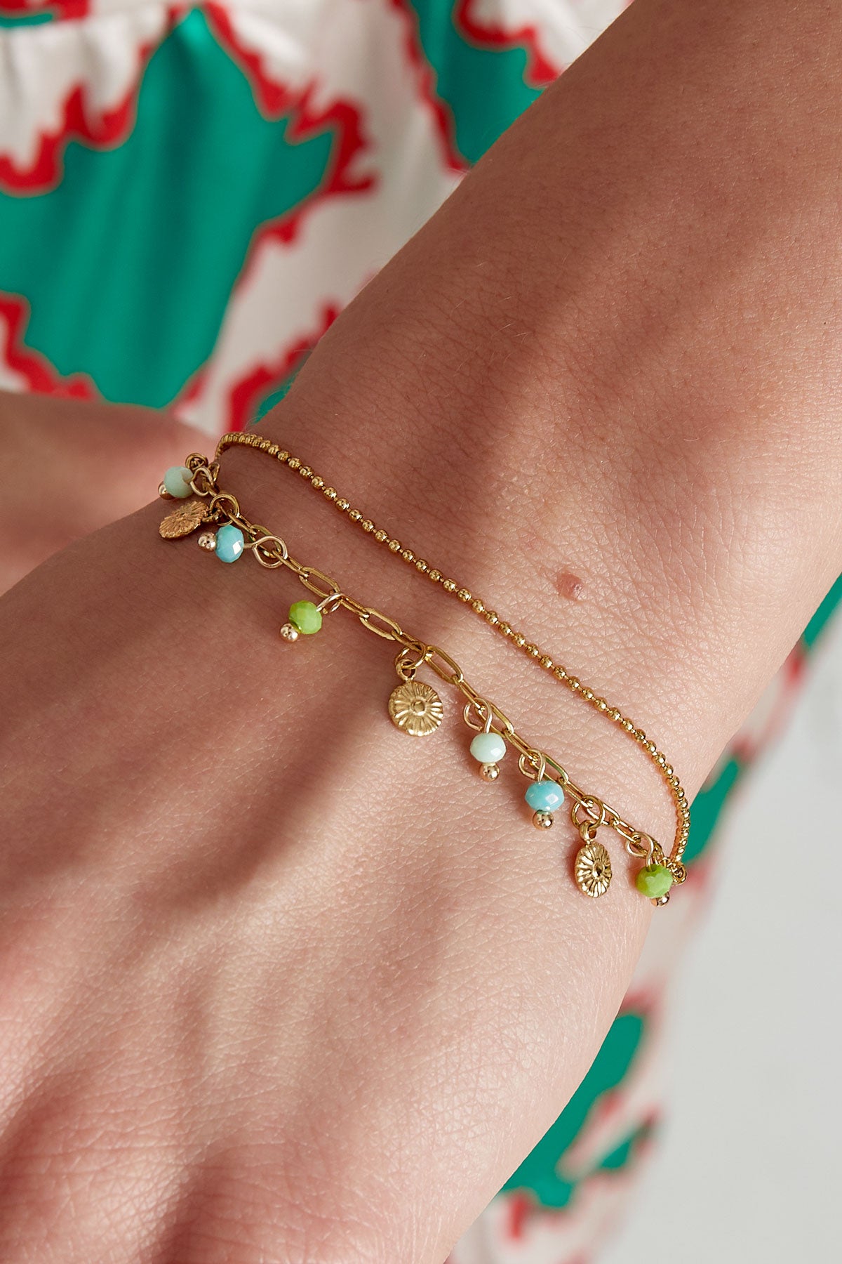 Armband mit Münzen und Perlen - rosa/Goldfarbe 