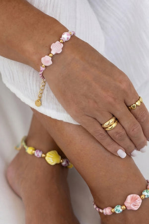 Armband mit Schildpatt- und Muschelperlen und Seilmotiv