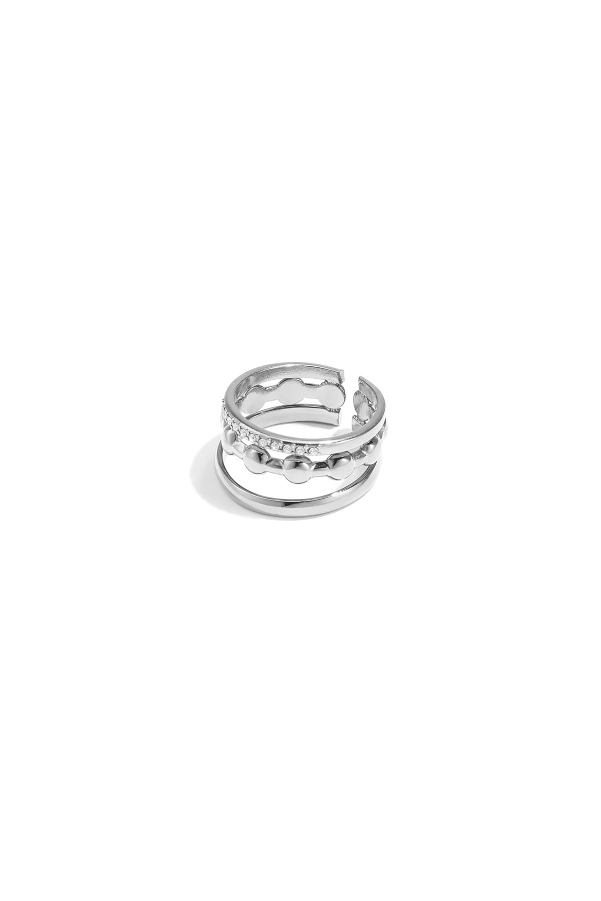 Dreilagiger Ring mit runden Details und Steinen